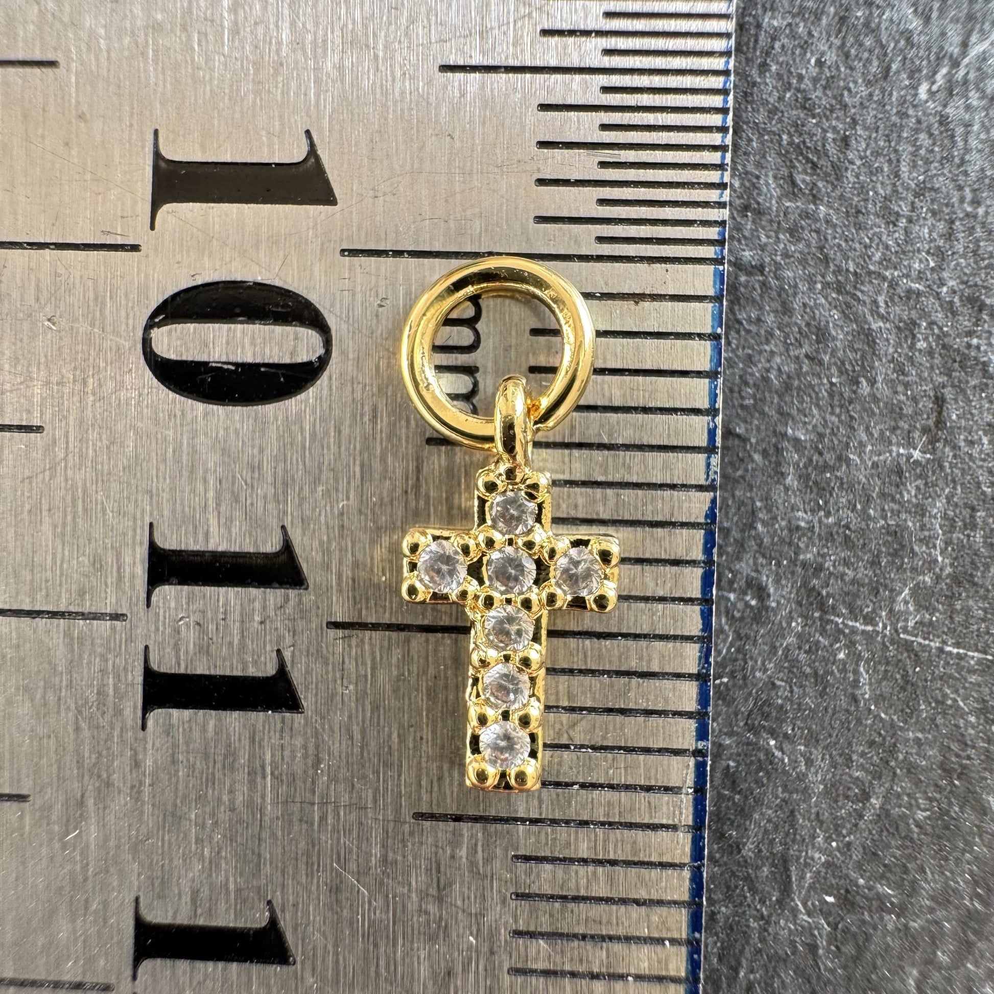 Breloque croix dorée zircons