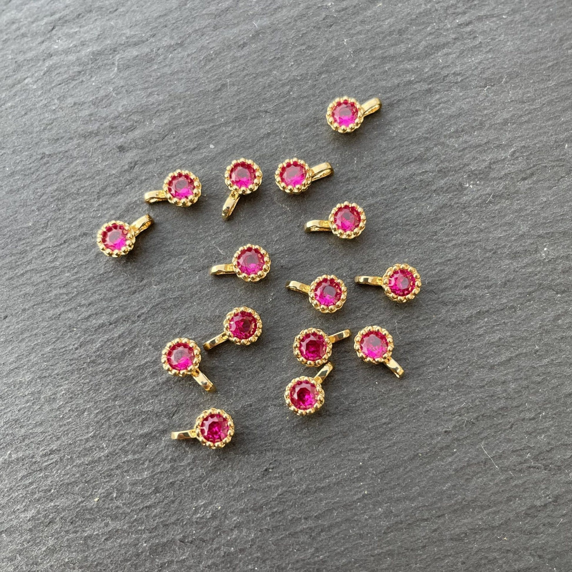 Breloque fleur fuchsia
