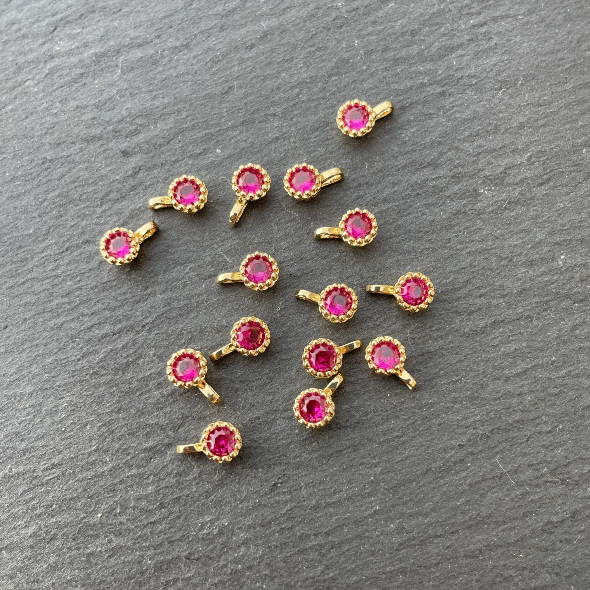 Breloque fleur fuchsia