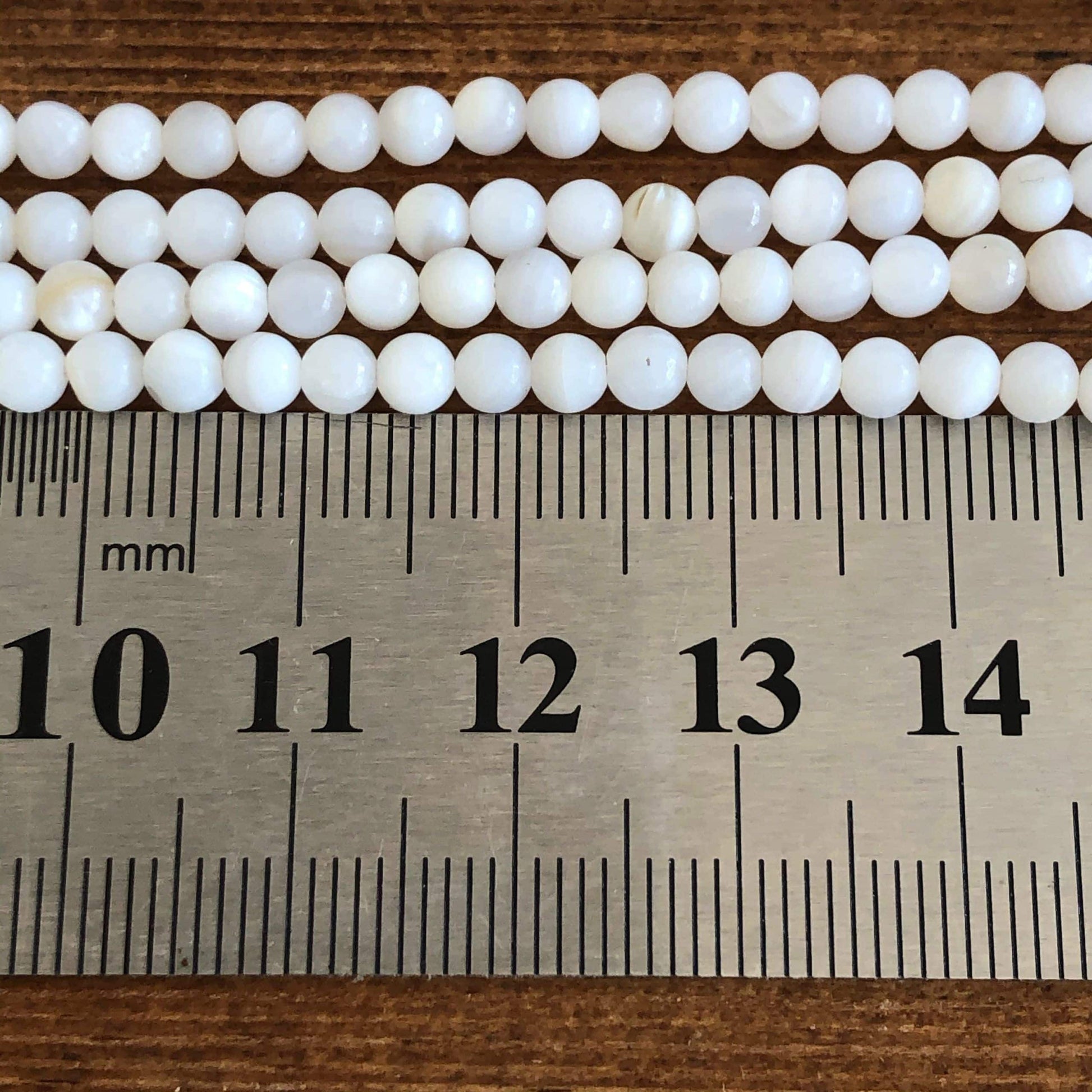 Coquillage blanc 4mm 1