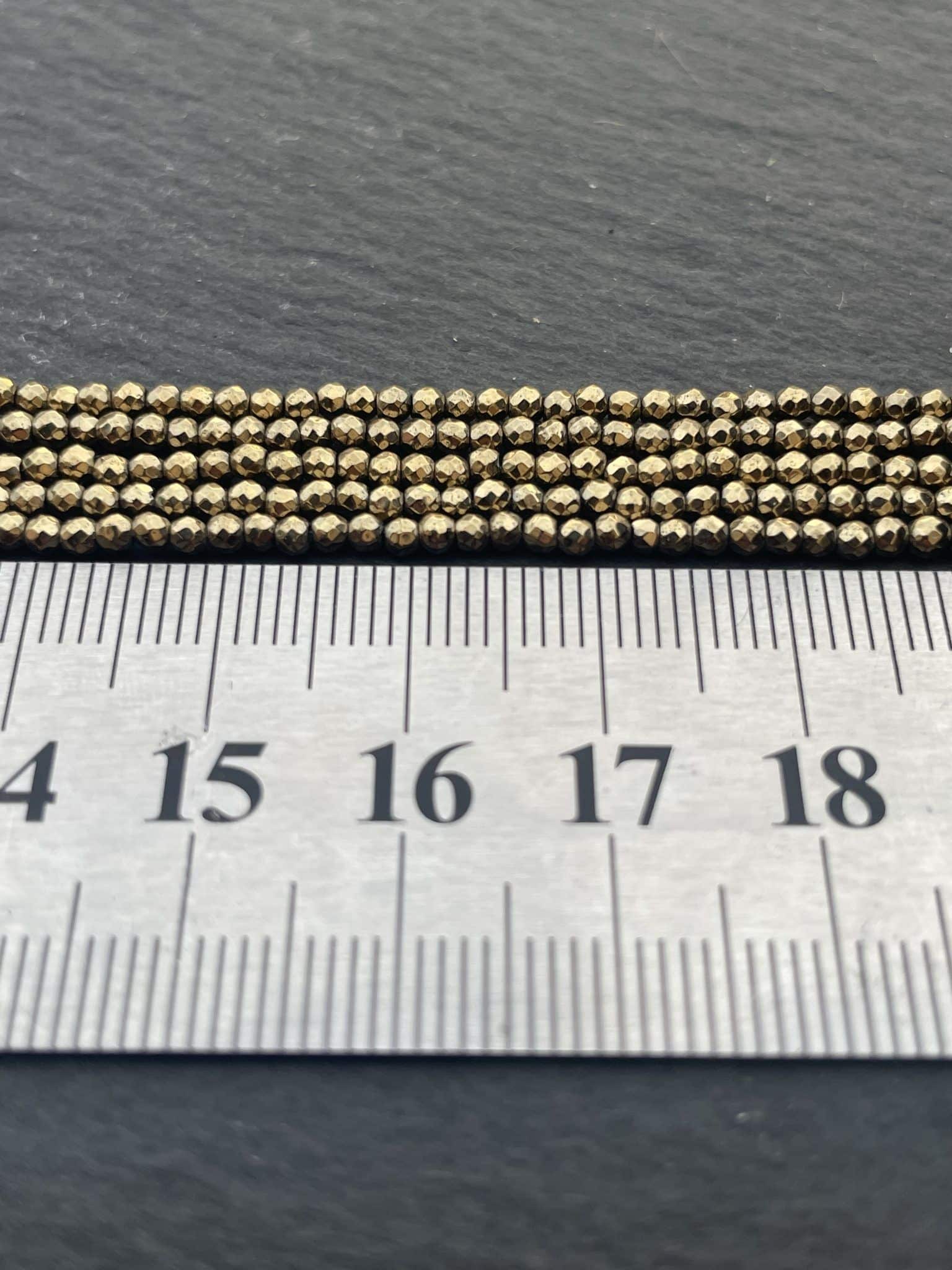 Hématite Dorée Ronde Facettée 2mm