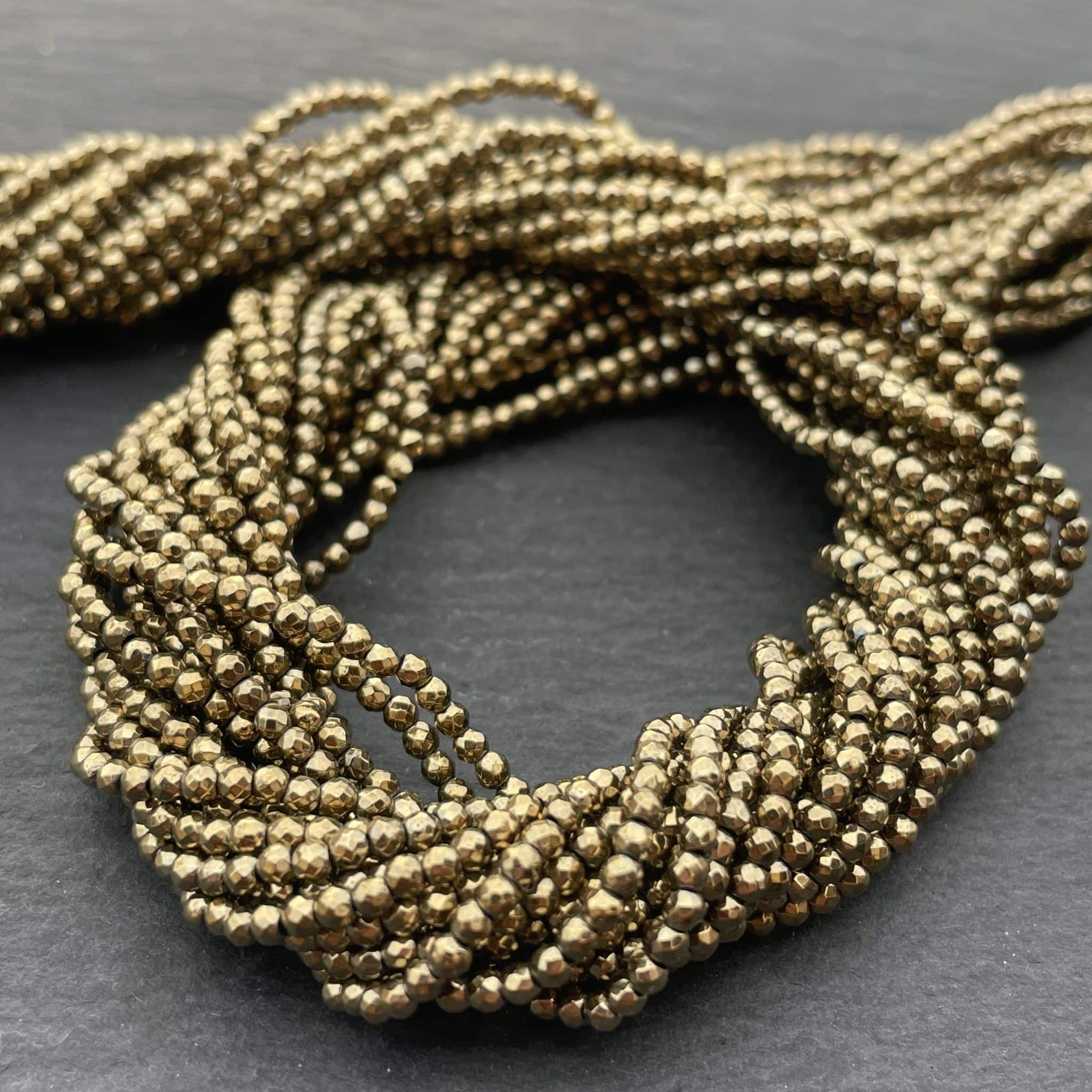 Hématite Dorée Ronde Facettée 2mm 1