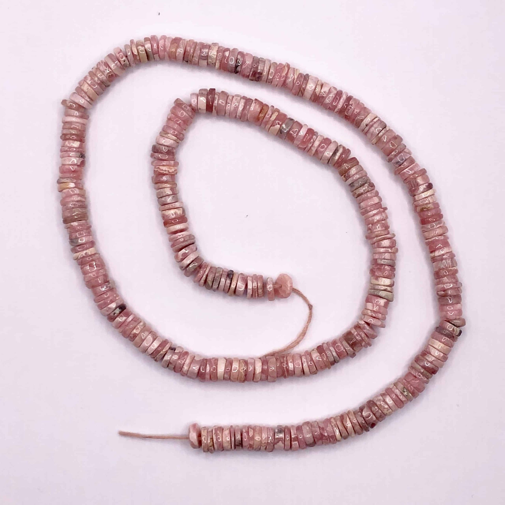 Heishi en Rhodochrosite 5-6 mm(1) 1