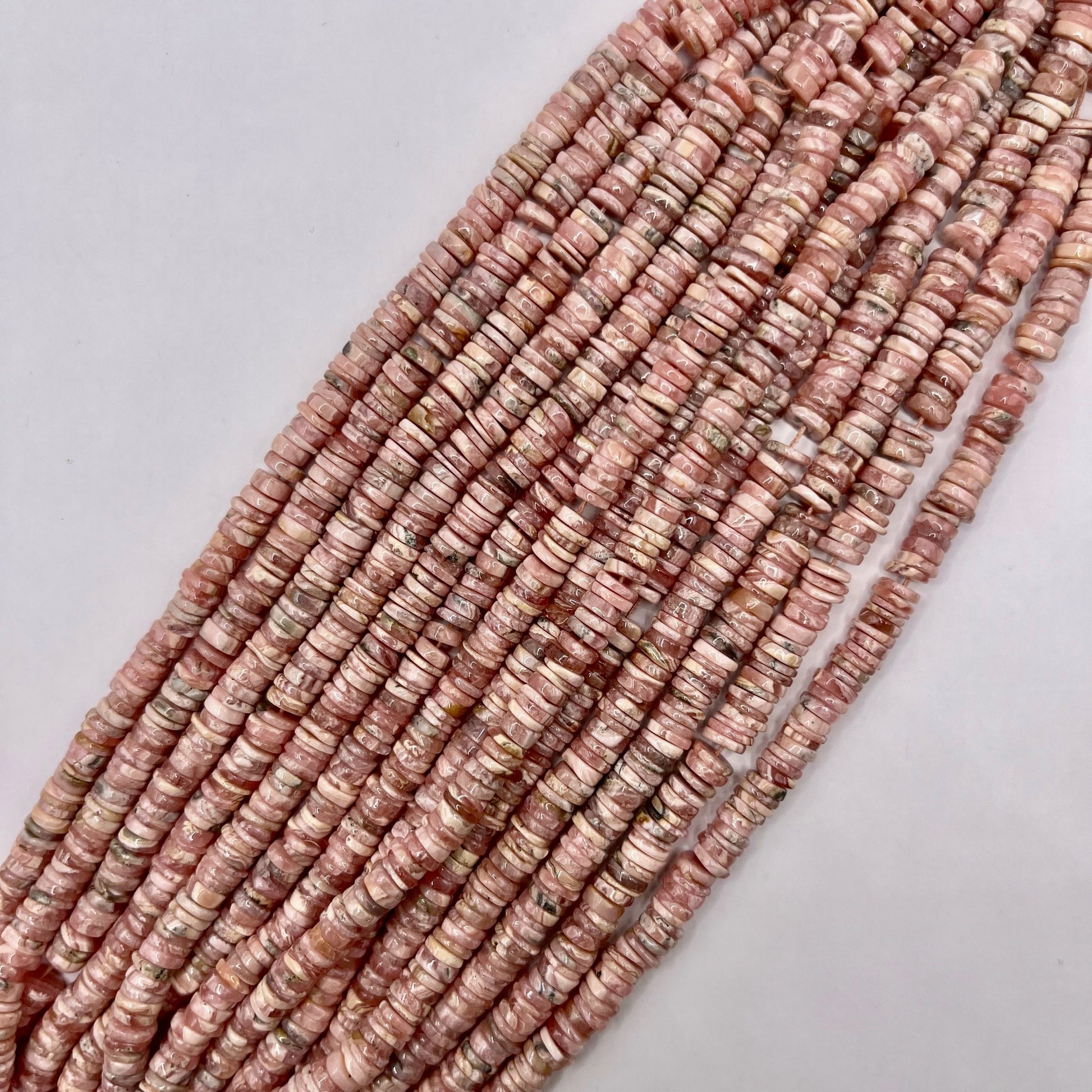 Heishi en Rhodochrosite 5-6 mm(1) 2
