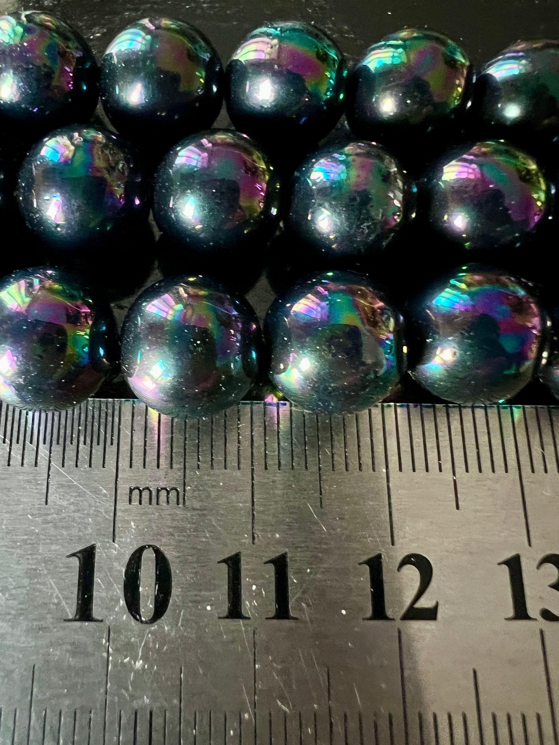 Fil de Perles de Coquillage noires 8mm