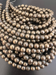 Fil de Perles Rondes en Pyrite 6mm