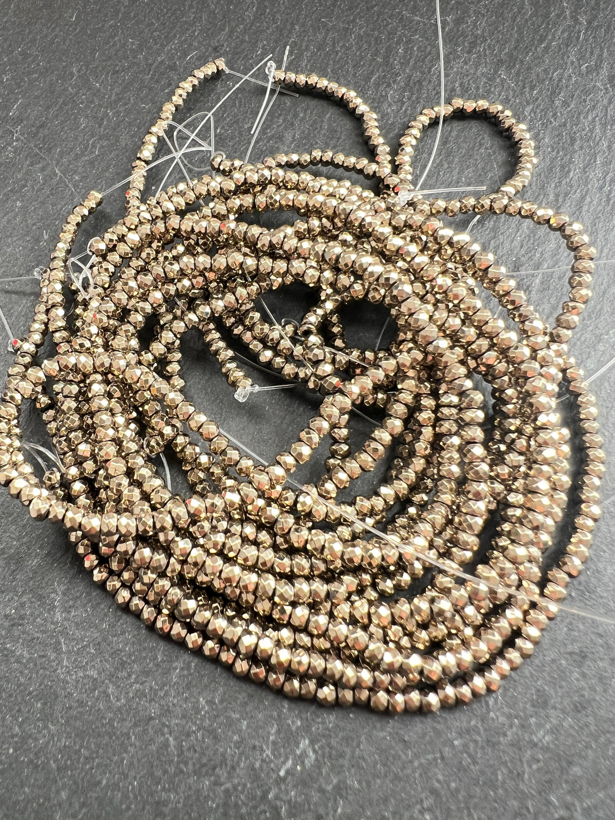 Hématite Dorée Facettée 3x2mm