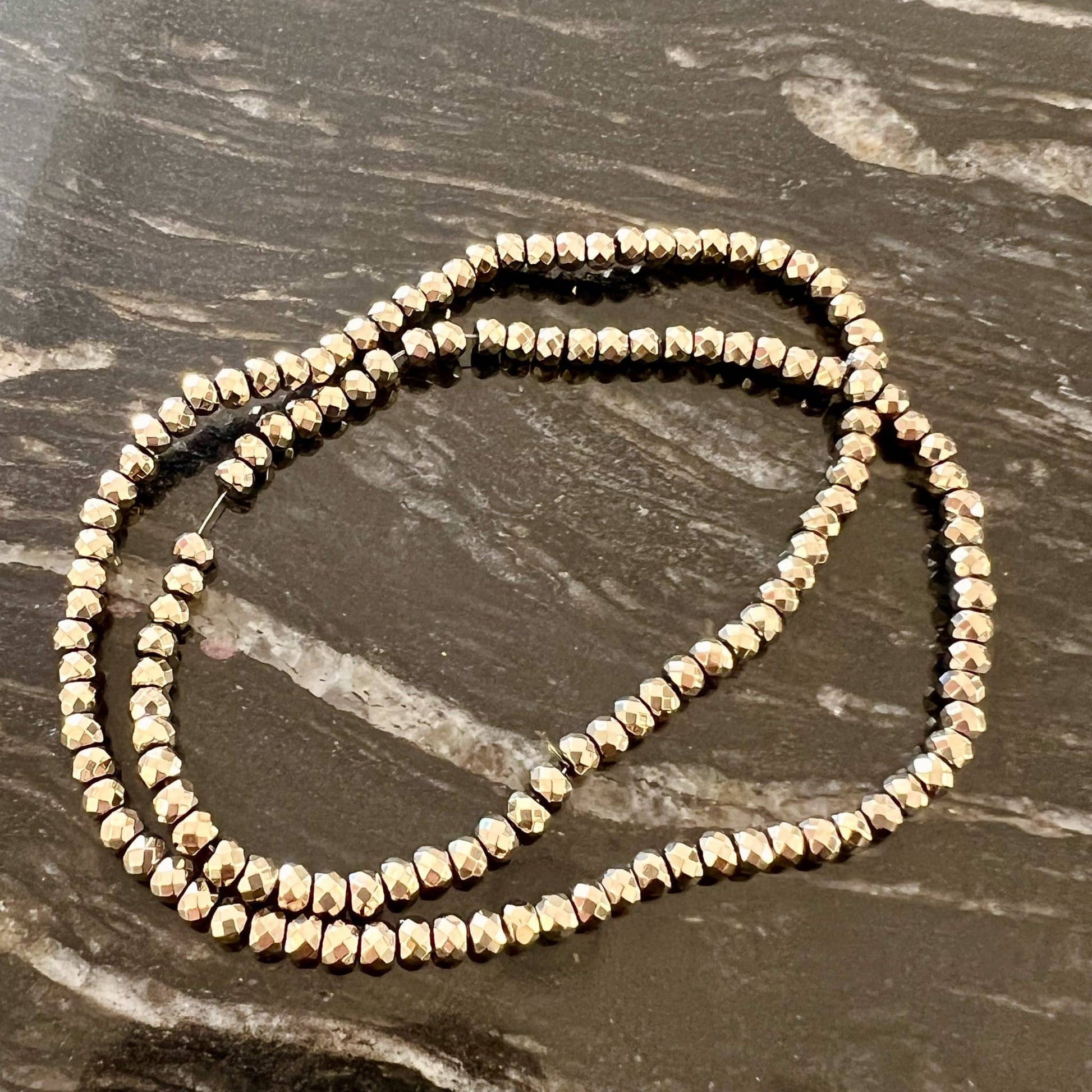 Hématite dorée 3x4mm