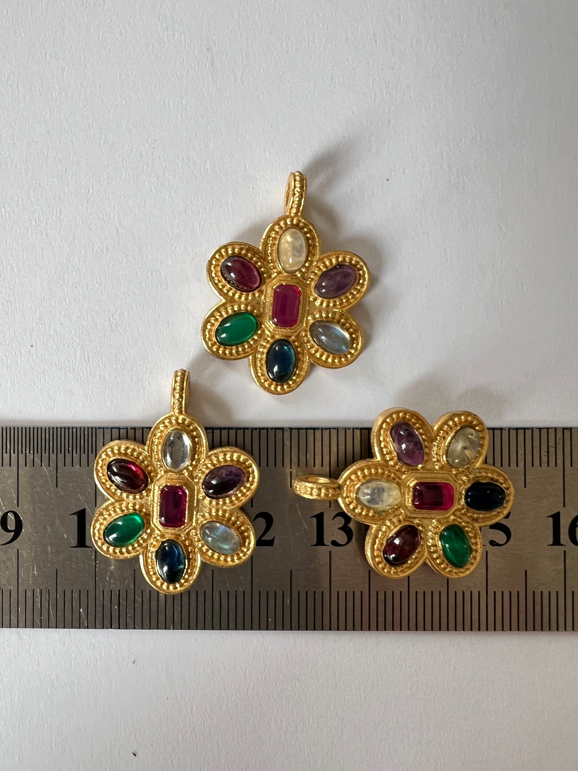 Médailles indiennes fleur